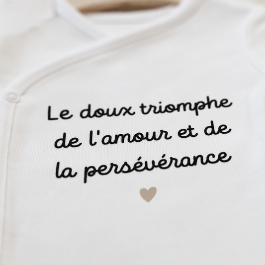 Body bébé "Le doux triomphe de l'amour et de la persévérance"